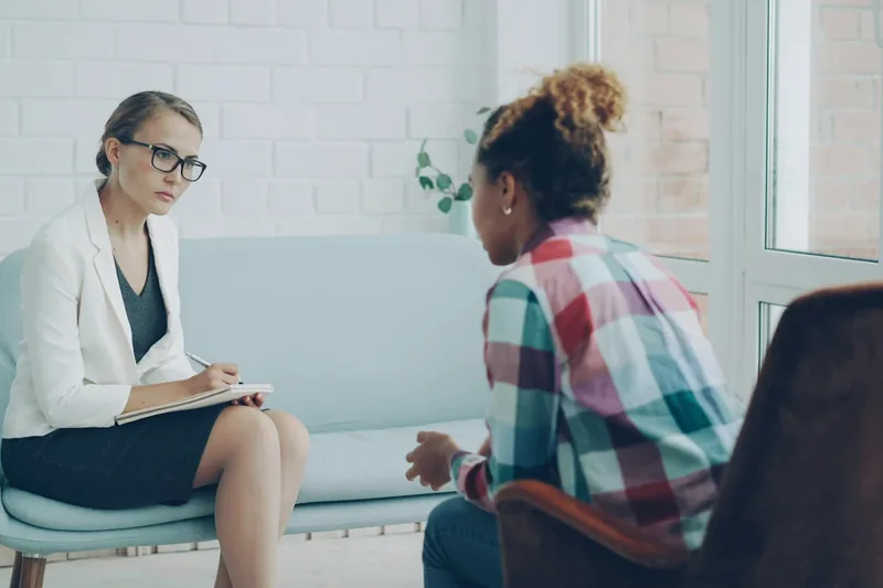 Parent and young person contributing to a developmental assessment