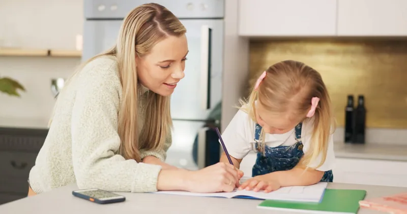 Parent supporting a child with learning and developmental needs